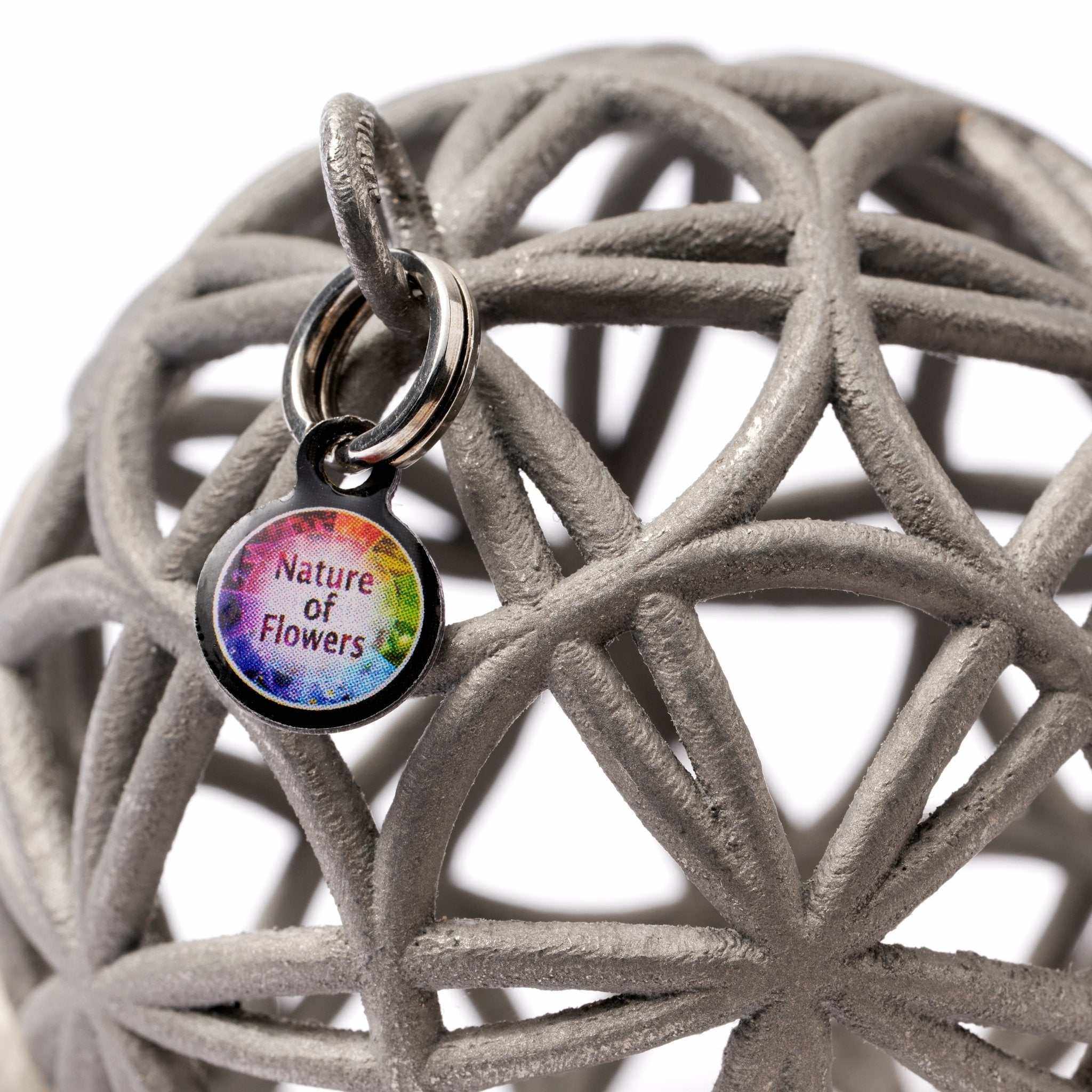Intricate 3D sacred geometry talisman Love Sphere in stainless steel symbolizing love and unity